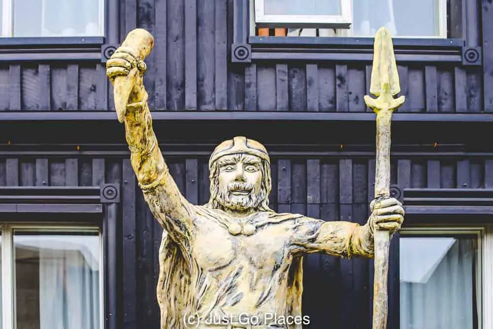 A wooden Viking statue at Viking Village in Hafnarfjordur Iceland