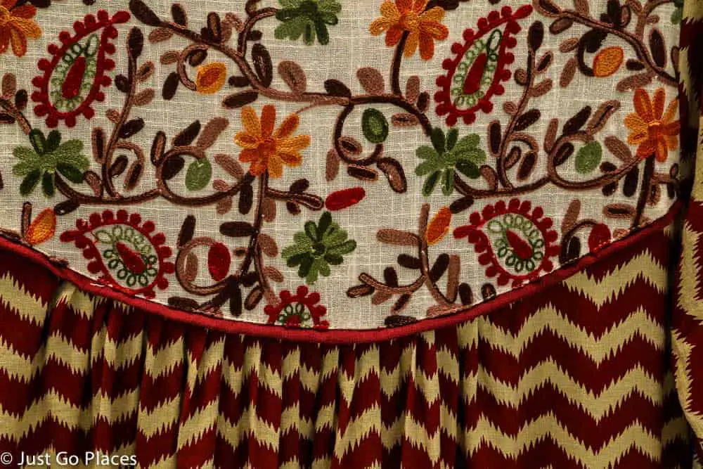 Traditional embroidery instead of glitter and beading.