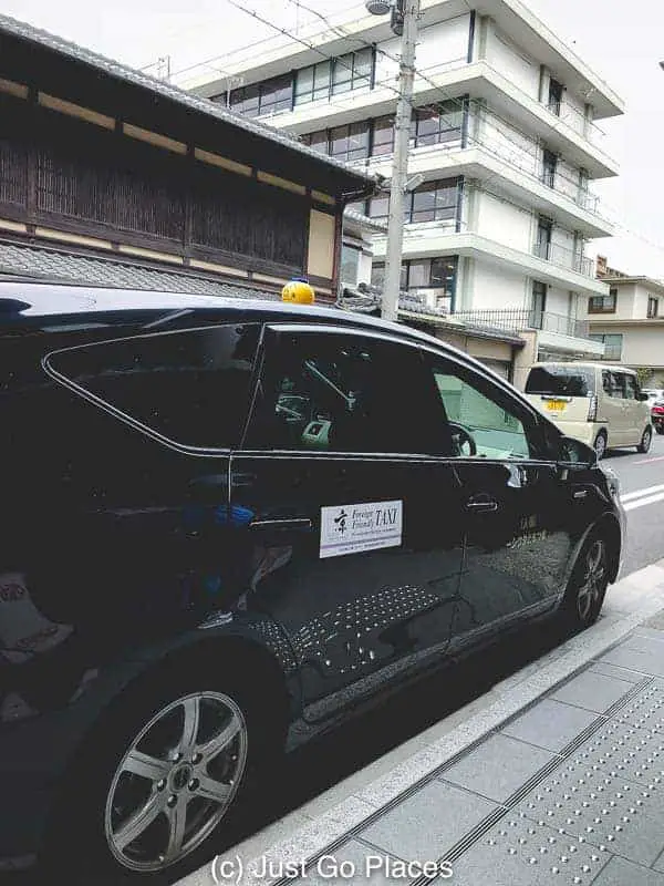 A taxi marks that it is foreign friendly in Kyoto