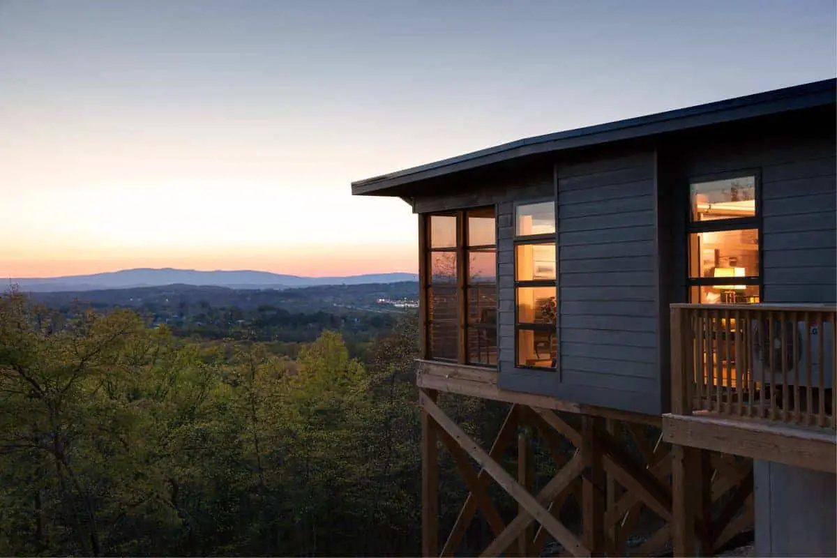 Sunset over an Iris Inn Cabin (image credit: Iris Inn Jumping Rocks)