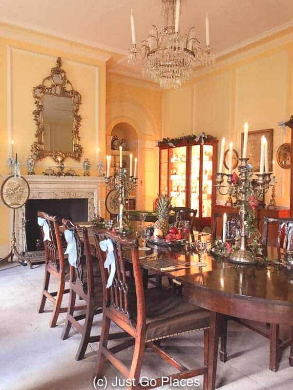 Georgian Christmas decorations at Fenton House London included these chairs decorated with a ribbon in a popular color called Georgian blue.