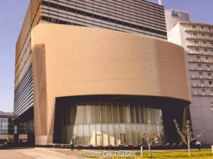 The gleam of the modern facade of the Kobe Earthquake museum.