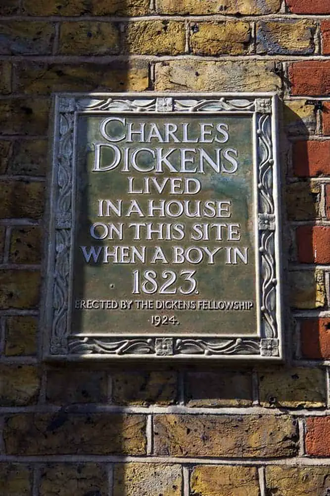 Plaque on Bayham Street in Camden, London locating the site on which Charles Dickens once lived prior to being shown the underbelly of Victorian life south of the River in Southwark.