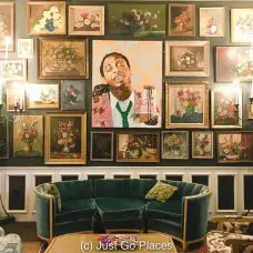 The Living Room at Jack Rose New Orleans with the Lil Wayne portrait.