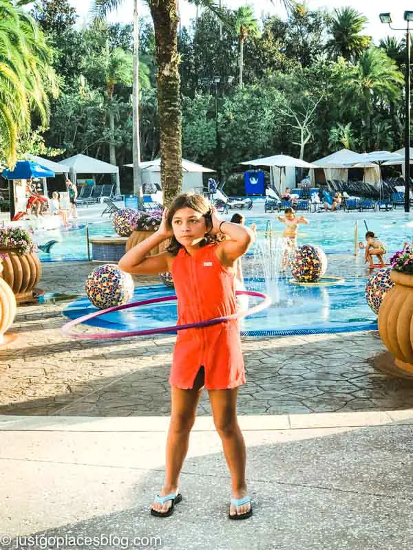 girl in hula hoop poolside at Hard Rock Hotel