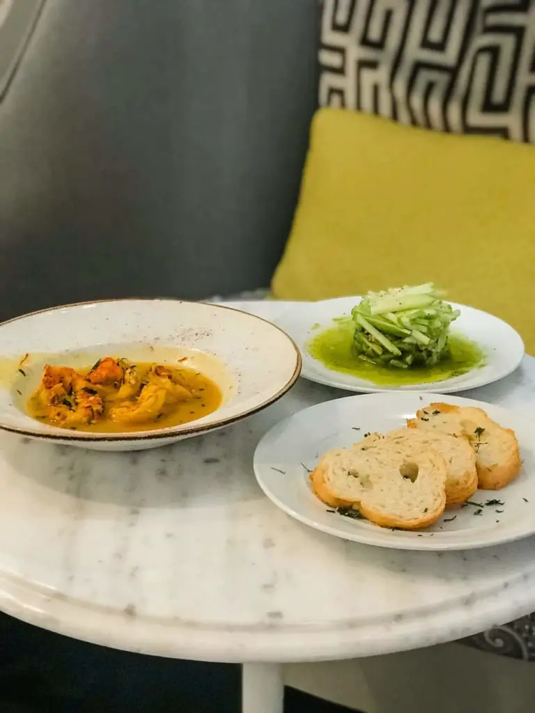 shrimp in sauce, bread and west indies salad at Elyton Hotel Room service