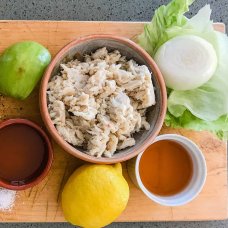 ingredients for West Indies Salad includes salt,peper, vinegar, oil, lemon, crabmeat, onion apple and lettuce