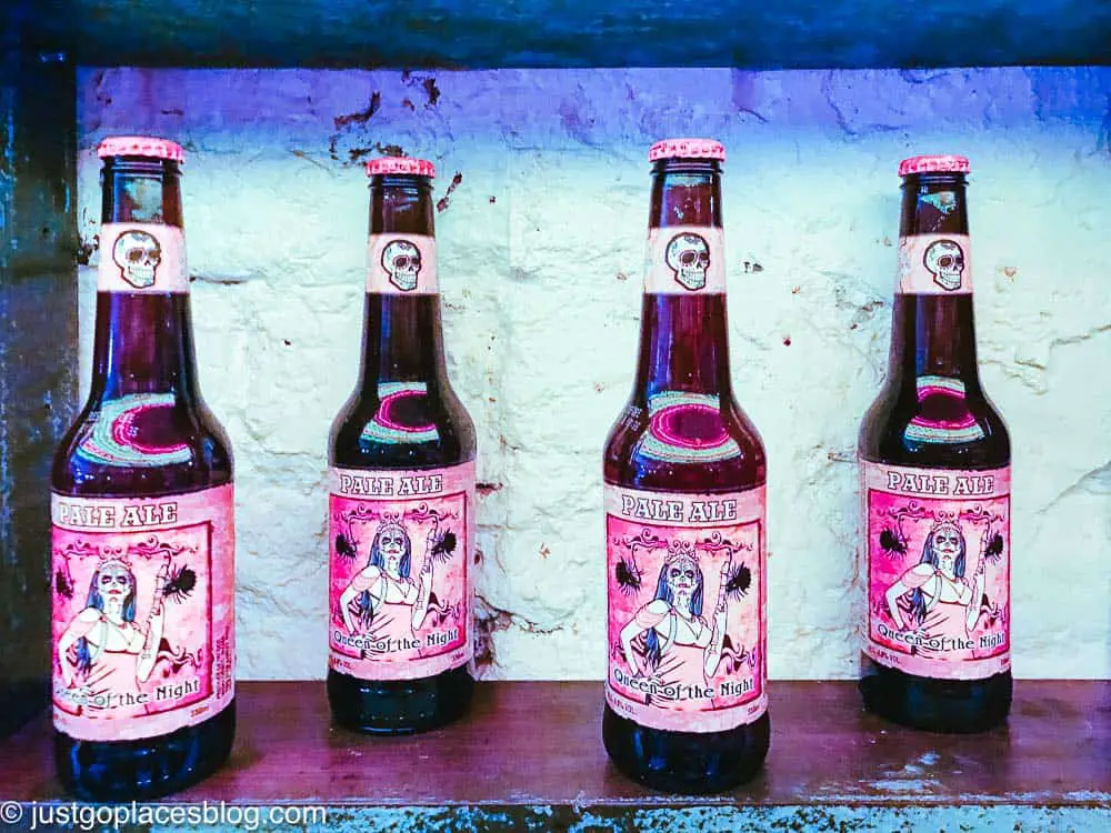 row of Mexican beer with pink labels